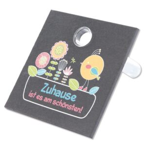 Schieferrelief mit Glasvase
